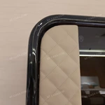Rounded-Corner Dark Wood Wine Cabinet with Tinted Glass Doors Quilted Beige Upholstered Panels and Interior Shelving